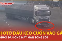 Bị ôtô đầu kéo cuốn vào gầm, người đàn ông may mắn sống sót 