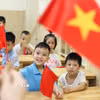 Học sinh Trường Tiểu học Bình Minh (phường Cửa Nam, Hà Nội) háo hức mong chờ ngày khai giảng. (Ảnh: Thanh Tùng/TTXVN)