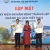 Trao quyết định Công bố công nhận điểm du lịch cho 2 đơn vị. (Ảnh: Sỹ Thắng/TTXVN)