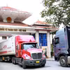 Hoạt động vận chuyển hàng hóa qua biên giới tại Cửa khẩu Quốc tế Thanh Thủy (Tuyên Quang). (Ảnh: Hoàng Hải/TTXVN)