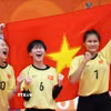 Nguyễn Thị Khánh Ly, Nguyễn Thị Thu Trang và Lê Thị Hồng Liên ăn mừng chiến thắng trong trận chung kết nội dung đôi nữ, môn Cầu mây tại ASIAD 2026, ngày 29/9. (Ảnh: THX/TTXVN phát)