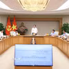 Phó Thủ tướng Hồ Quốc Dũng chủ trì họp về một số nội dung của dự án Luật Đất đai (sửa đổi). (Ảnh: An Đăng/TTXVN)