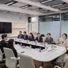 Đại diện Đại sứ quán Việt Nam tại Hàn Quốc, Hội Sinh viên Việt Nam tại Hàn Quốc (VSAK), Trường Đại học Nữ sinh Ewha trao đổi tại phiên làm việc tại Ngày hội. (Ảnh: Đức Thắng/TTXVN)