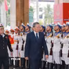 Tổng Bí thư Tô Lâm duyệt Đội Danh dự Quân đội Nhân dân Việt Nam tại lễ đón. (Ảnh: Trọng Đức/TTXVN)