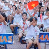 Học sinh dự khai giảng năm học mới. (Ảnh: Minh Quyết/TTXVN)