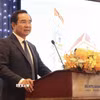 Ông Nguyễn Văn Được, Chủ tịch Ủy ban Nhân dân Thành phố Hồ Chí Minh, phát biểu tại Hội nghị. (Ảnh: Xuân Anh/TTXVN)