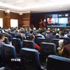 Quang cảnh buổi kết nối tham gia Hội nghị toàn quốc quán triệt các Nghị quyết, Chỉ thị của Bộ Chính trị của cộng đồng người Việt Nam tại Lào. (Ảnh: Xuân Tú/TTXVN)