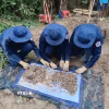 Đội K93 tỉnh An Giang quy tập hài cốt liệt sỹ tại xã Ô Lâm, tỉnh An Giang. (Ảnh: TTXVN phát)