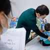 Nhiều tác nhân gây bệnh truyền nhiễm phát sinh, lây lan trong thời tiết chuyển mùa. (Ảnh: Minh Quyết/TTXVN)