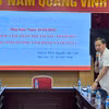 Phó giáo sư Nguyễn Văn Tuấn - Viện trưởng Viện Sức khỏe Tâm thần thông tin tại buổi họp. (Ảnh: PV/Vietnam+)