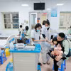 Ngành y tế hướng đến mục tiêu mỗi người dân được khám sức khỏe định kỳ hàng năm. (Ảnh: TTXVN/Vietnam+)