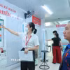 Người dân đăng ký khám bệnh bảo hiểm y tế tại bệnh viện đa khoa Xanh Pôn (Hà Nội). (Ảnh: TTXVN)