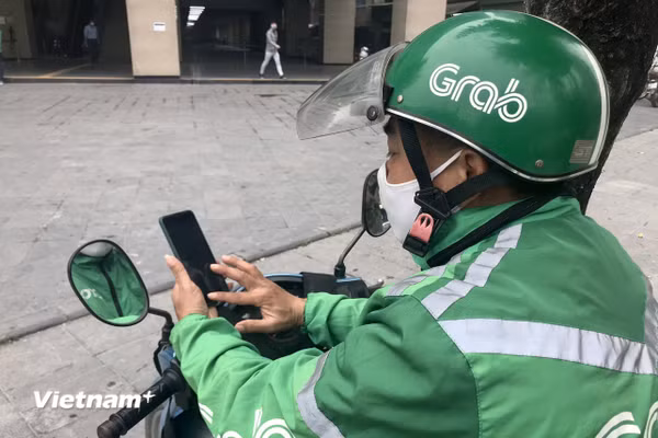 Tìm lời giải “bài toán Grab” để tài xế, doanh nghiệp và hành khách… đều vui