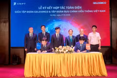 Ông Huỳnh Quang Liêm, Tổng Giám đốc Tập đoàn VNPT và ông Vũ Văn Hậu Chủ tịch Hội đồng Quản trị kiêm Tổng Giám đốc Tập đoàn Geleximco, tại lễ ký kết thỏa thuận hợp tác giữa hai Tập đoàn. (Ảnh: PV/Vietnam+)