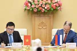 Ký kết Bản ghi nhớ giữa Bộ Công Thương Việt Nam và Nga về hợp tác nghiên cứu khoa học, phát triển công nghệ và đổi mới sáng tạo trong lĩnh vực công nghiệp. (Ảnh: Trần Việt/TTXVN)