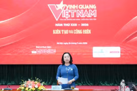 Bà Thái Thu Xương, Phó Chủ tịch Tổng Liên đoàn Lao động Việt Nam cung cấp thông tin về chương trình. (Ảnh: PV/Vietnam+)