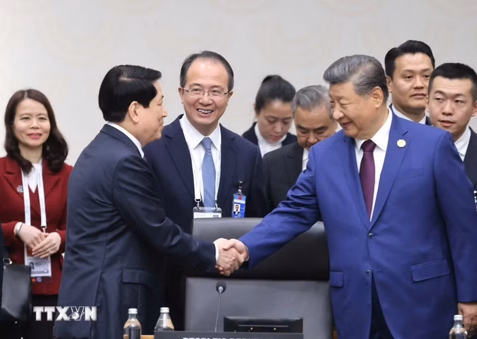 Chủ tịch nước Lương Cường với Tổng Bí thư, Chủ tịch nước Trung Quốc Tập Cận Bình. (Ảnh: Lâm Khánh/TTXVN)