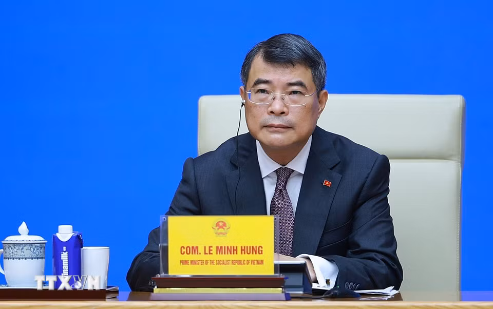 Thủ tướng Lê Minh Hưng gặp, trao đổi với các doanh nghiệp Trung Quốc đang đầu tư tại Việt Nam. (Ảnh: Dương Giang/TTXVN)