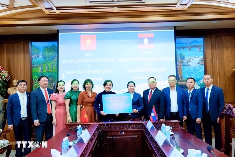 ttxvn_cac-dia-phuong-viet-nam-lao-tang-cuong-hop-tac-cong-tac-mat-tran-9050058.jpg