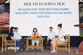Các đại biểu chia sẻ giải pháp xây dựng, phát triển bền vững ngành hàng điều tại thành phố Đồng Nai. (Ảnh: Nhật Bình/TTXVN)