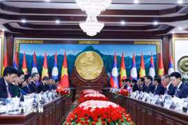 Tổng Bí thư Tô Lâm hội đàm với Tổng Bí thư, Chủ tịch nước Lào Thongloun Sisoulith. (Ảnh: Thống Nhất/TTXVN)