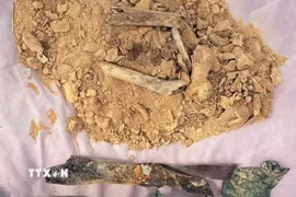 Hài cốt liệt sỹ được phát hiện tại xã Hiếu Giang, tỉnh Quảng Trị. (Ảnh: TTXVN phát)