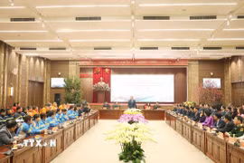 Tổng Bí thư Tô Lâm thăm, chúc Tết Đảng bộ, chính quyền và Nhân dân Thủ đô. (Ảnh: Thống Nhất/TTXVN)