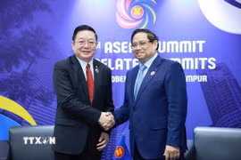 Thủ tướng Phạm Minh Chính gặp Tổng Thư ký ASEAN Kao Kim Hourn. (Ảnh: Dương Giang/TTXVN)