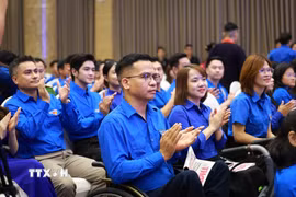 Các đại biểu thanh niên tham gia đối thoại với Thủ tướng Chính phủ. (Ảnh: Dương Giang/TTXVN)