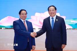 Thủ tướng Phạm Minh Chính và Thủ tướng Lào Sonexay Siphandone đồng chủ trì Kỳ họp lần thứ 48 Ủy ban liên Chính phủ về hợp tác song phương Việt Nam-Lào. (Ảnh: Dương Giang/TTXVN)