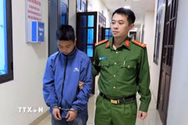 Đối tượng Nguyễn Văn San tại cơ quan Công an. (Ảnh: TTXVN phát)
