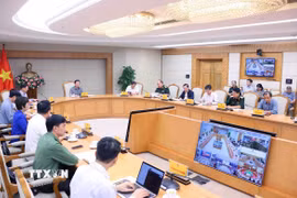 Quang cảnh cuộc họp triển khai công tác ứng phó với cơn bão số 12 (bão Fengshen) và sau mưa bão. (Ảnh: Văn Điệp/TTXVN)