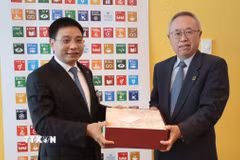 Phó Thủ tướng Chính phủ Nguyễn Văn Thắng (trái) và Phó Tổng Thư ký Liên hợp quốc Li Junhua tại cuộc gặp. (Ảnh: Thanh Tuấn/TTXVN)