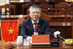 Phó Bí thư Thành ủy, Chủ tịch HĐND thành phố Đà Nẵng Nguyễn Đức Dũng phát biểu tại buổi làm việc với lãnh đạo tỉnh Xekong. (Ảnh: Xuân Tú/TTXVN)