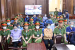 Các bị cáo tại phiên tòa (ngày 1/4). (Ảnh: Thanh Vũ/TTXVN)