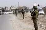 Quân cảnh Nga tuần tra gần khu vực Đông Douma. (Nguồn: AFP/TTXVN)