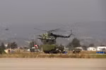Máy bay trực thăng quân sự của Nga tại căn cứ Hmeimim ở tỉnh Latakia, Tây Bắc Syria. (Nguồn: AFP/TTXVN)