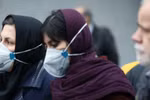 Người dân Iran đeo khẩu trang tại địa điểm công cộng. (Nguồn: AFP)