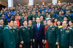 Chủ tịch nước Trần Đại Quang với cán bộ, chiến sỹ, sỹ quan chỉ huy của Bộ Tư lệnh Bộ đội Biên phòng. (Ảnh: Nhan Sáng/TTXVN)