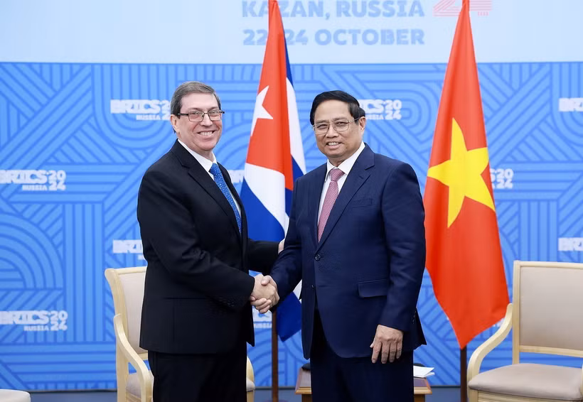 Thủ tướng Phạm Minh Chính tiếp Bộ trưởng Ngoại giao Cuba Bruno Rodriguez Parrilla. (Ảnh: Dương Giang/TTXVN)
