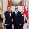 Tổng Bí thư Tô Lâm và Thủ tướng Liên hiệp Vương quốc Anh và Bắc Ireland Keir Starmer. (Ảnh: Thống Nhất/TTXVN)