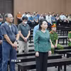 Bị cáo Nguyễn Thị Kim Tiến và các bị cáo khác tại phiên tuyên án. (Ảnh: Kim Anh/TTXVN)