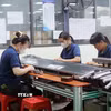 Công ty TNHH Công nghệ điện tử Freeport Việt Nam, Khu Công nghiệp Đồng Văn I đã và đang triển khai nhiều chính sách ưu đãi hấp dẫn nhưng vẫn khó tuyển dụng do nguồn lao động khan hiếm. (Ảnh: Nguyễn Chinh/TTXVN)