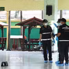 Cảnh sát làm nhiệm vụ tại hiện trường một vụ xả súng Thái Lan. (Ảnh: THX/TTXVN phát)