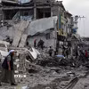 Tòa nhà tại phía Đông Nam thành phố Gaza bị phá hủy sau cuộc không kích của Israel. (Ảnh: THX/TTXVN)