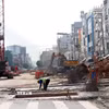 Công trường thi công dự án metro Bến Thành-Tham Lương trên đường Cách mạng Tháng Tám. (Ảnh: Tiến Lực/TTXVN)