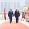 Chủ tịch Trung Quốc Tập Cận Bình và Tổng thống Mỹ Donald Trump. (Ảnh: THX/TTXVN)