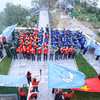 Lễ chào cờ “Tôi yêu Tổ quốc tôi”, theo nghi thức của Hội Liên hiệp Thanh niên Việt Nam tại cột cờ A Pa Chải (xã Sín Thầu). (Ảnh: TTXVN phát)