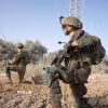 Binh sỹ Israel tiến hành hoạt động quân sự tại Dải Gaza. (Ảnh: THX/TTXVN)