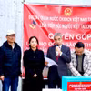 Đại sứ Nguyễn Đắc Thành phát động quyên góp ủng hộ đồng bào bị ảnh hưởng bão lụt trong nước. (Ảnh: TTXVN)